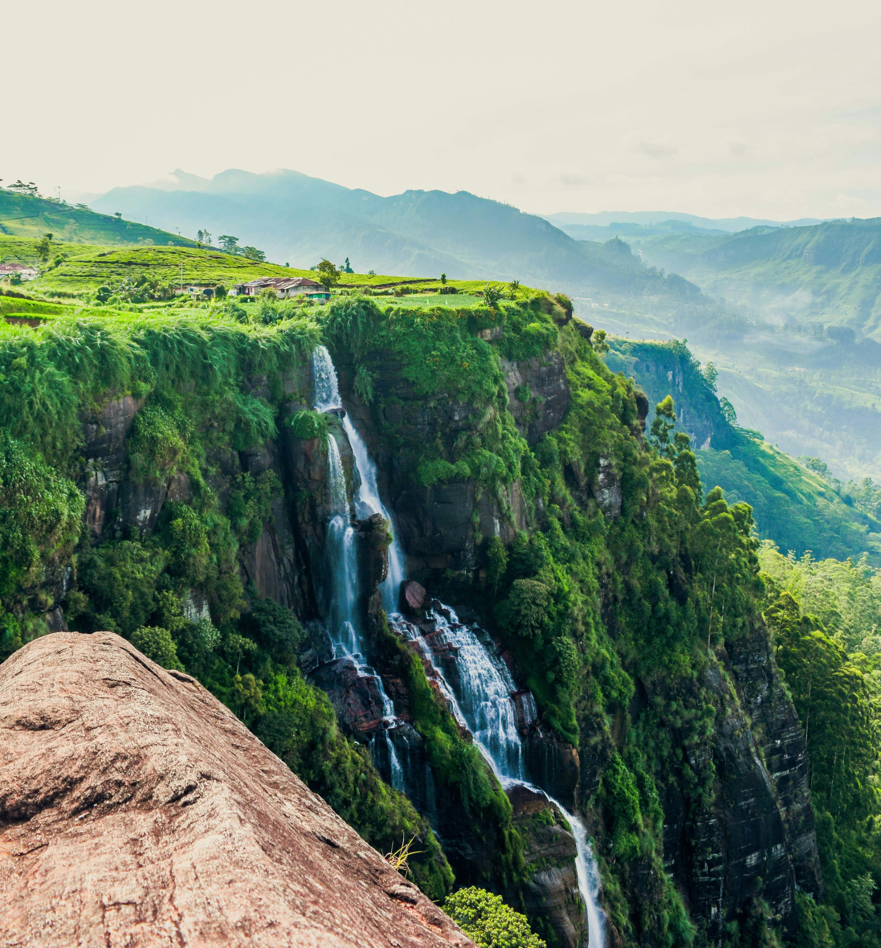 Devon Falls tumbling through misty hill-country tea estates